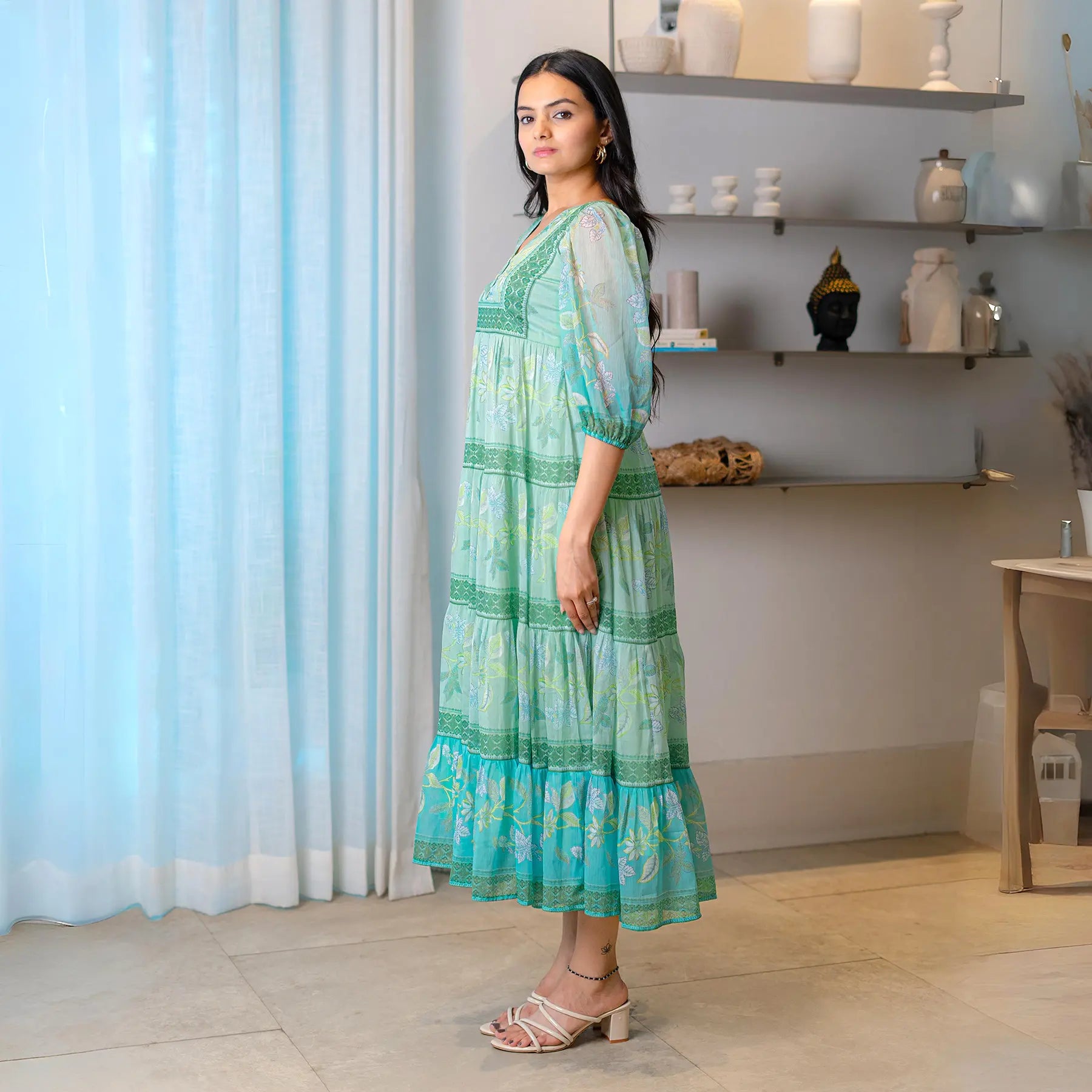 Side view of aqua maxi dress for women in chiffon, ideal for festive gatherings.