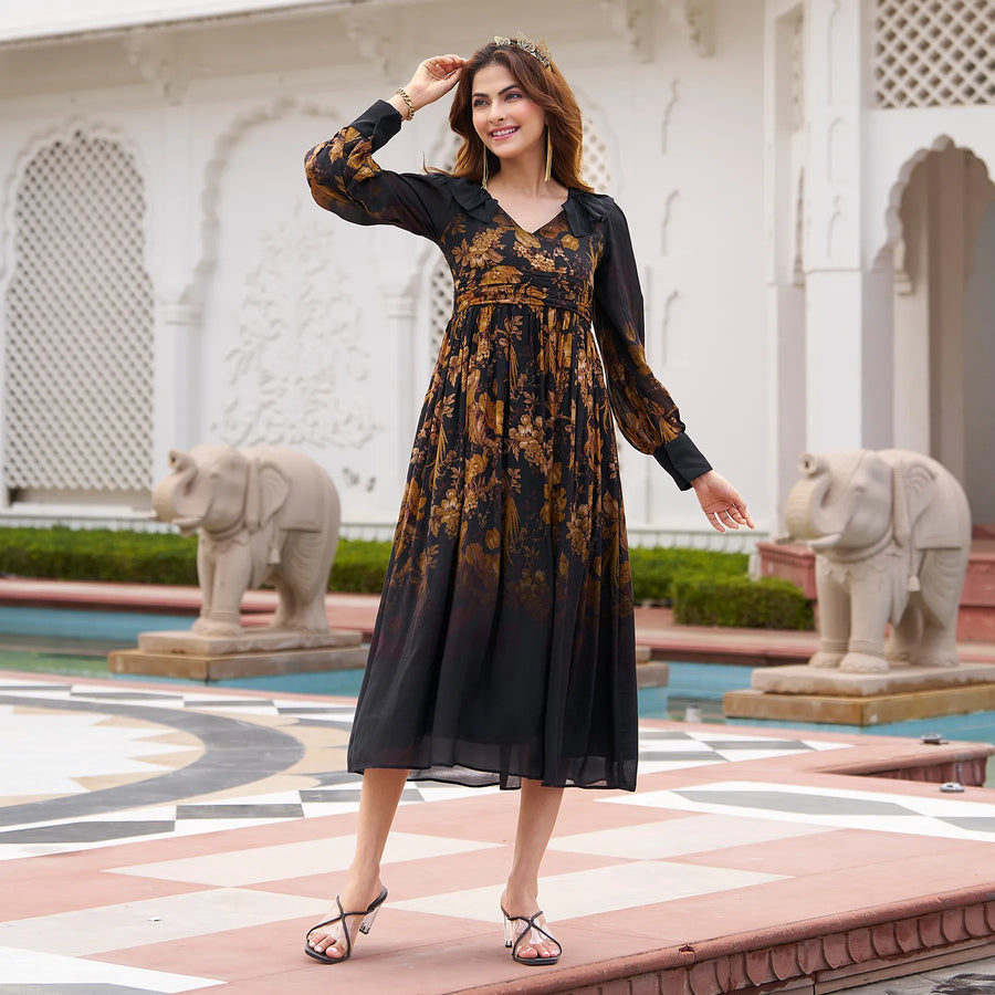 Black floral A-line midi dress with long sleeves and collar, hand on head