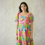 Close-up of neckline and sleeves – vibrant midi dress for women in nature-inspired cactus print.