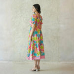 Side view of cactus print midi dress – soft puff sleeves and flattering A-line shape.