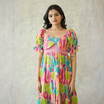 Close-up of neckline and sleeves on blush cactus one piece dress for women.
