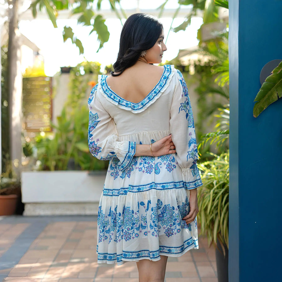 Back view airy shape of a stylish knee length short summer dress