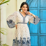 Close-up view highlighting the V-neckline, flared sleeves, and floral print of this co ord set for women.