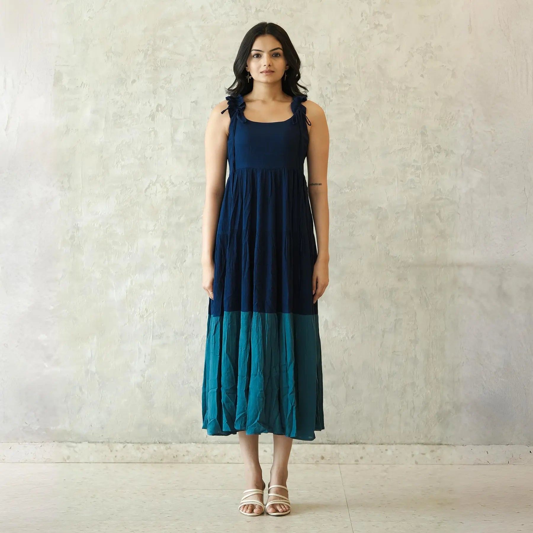 Front view of flowy indigo maxi dress for women, casual summer resort wear.