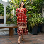 Walking pose in a printed full sleeve long dress — graceful look for Diwali outings and family get-togethers.