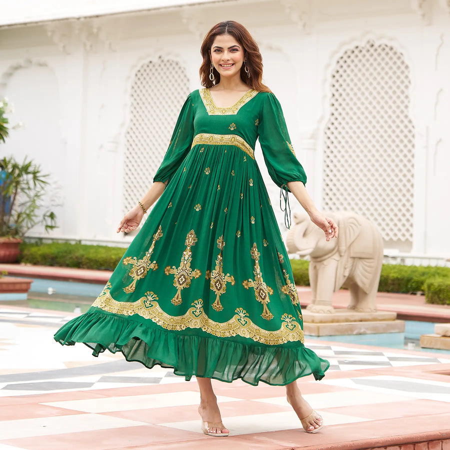 Twirling pose in a green long maxi dress  with flared hemline, ideal for Diwali festive parties and evening celebrations.