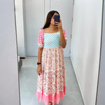 Real mirror selfie of a chic maxi one-piece outfit suited for festive nights and travel.
