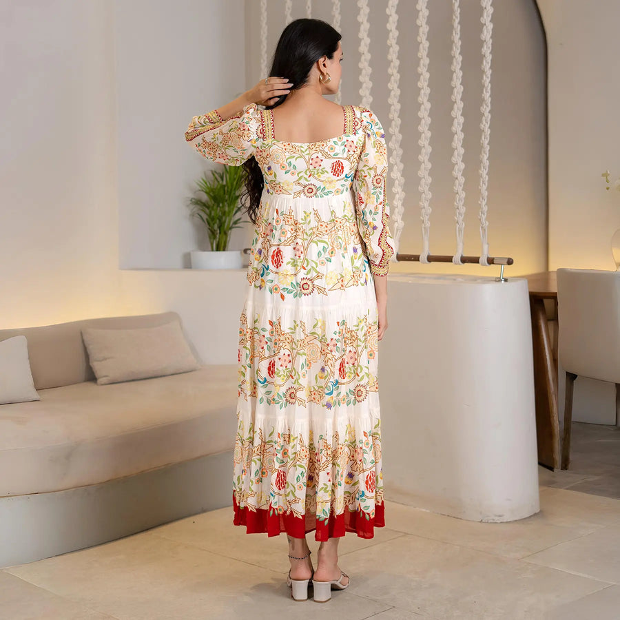 Back view highlighting the long flow of the maxi dress, a graceful choice for festive occasions.
