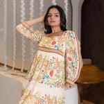 Close-up view showing neckline and sleeve detail of a long sleeve floral A-line maxi dress, styled for elegant evenings.