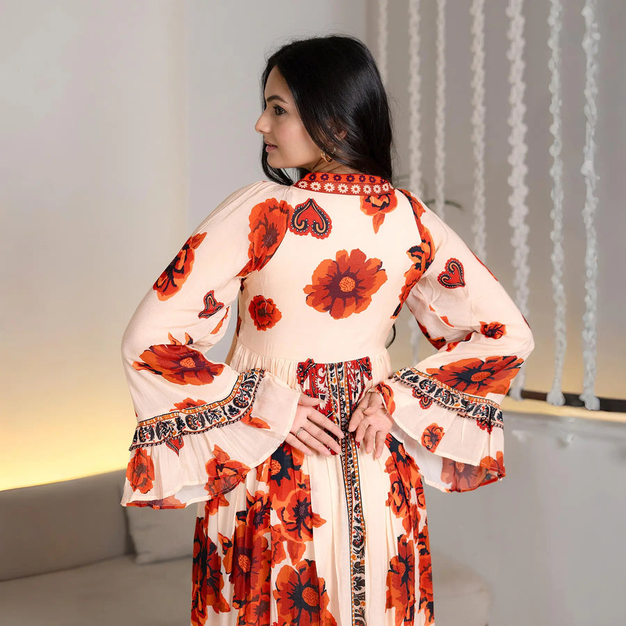 Close-up back view of the Saffron Valley floral maxi dress with bell sleeves, crafted for elegant occasions.