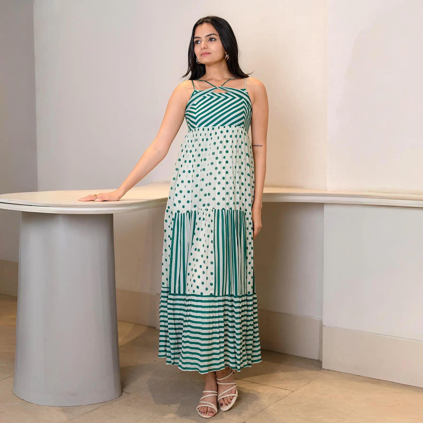 Straight front pose showing a long maxi dress with striped and polka print — perfect for summer evenings and casual birthdays.