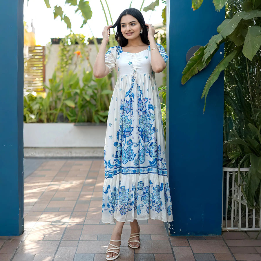 Front-facing pose in a breezy floral maxi dress, ideal for festive functions, birthday and summer evenings.