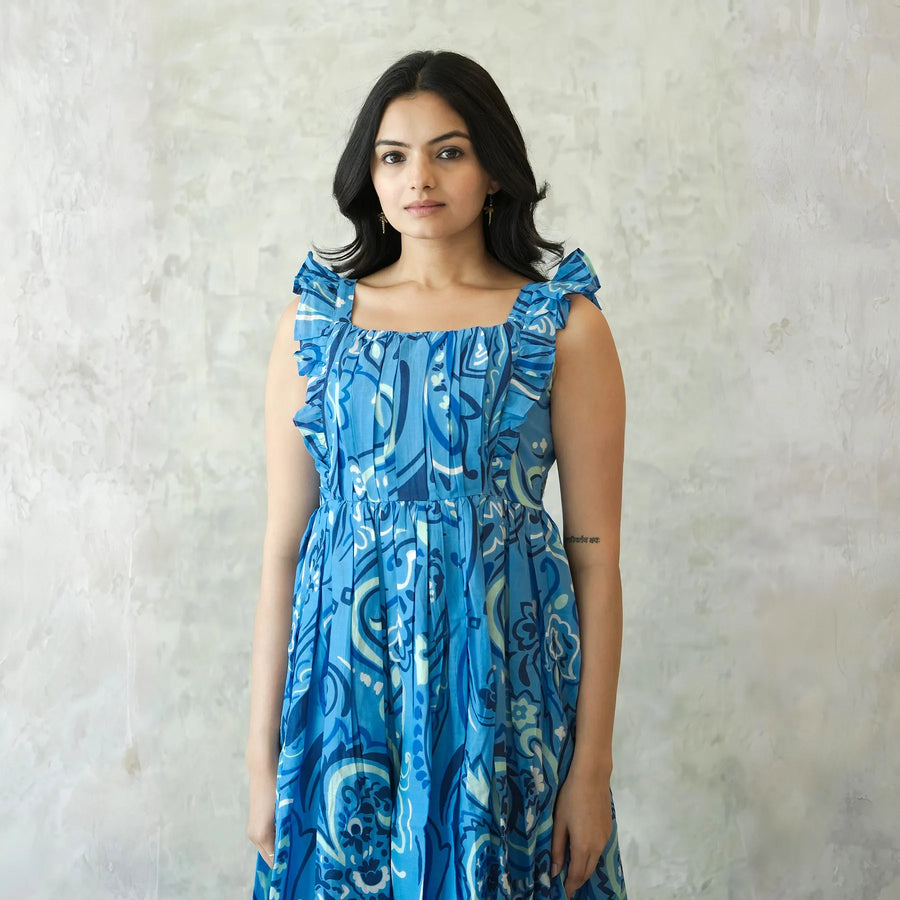Close-up of midi dress for women with ruffled sleeves — stylish summer birthday dress option.