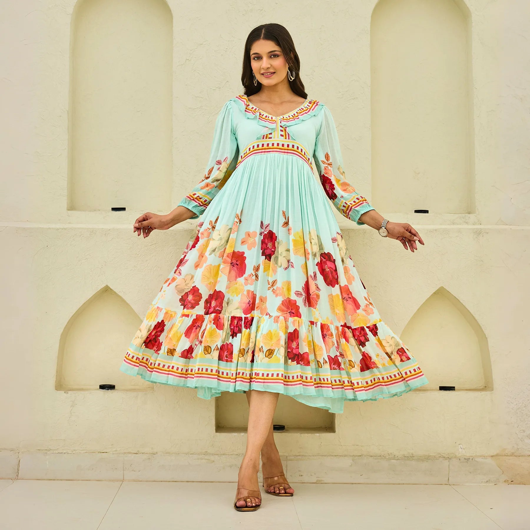 Breezy floral summer dress twirl pose showing the flowy A-line silhouette and puff sleeves, ideal for vacations.