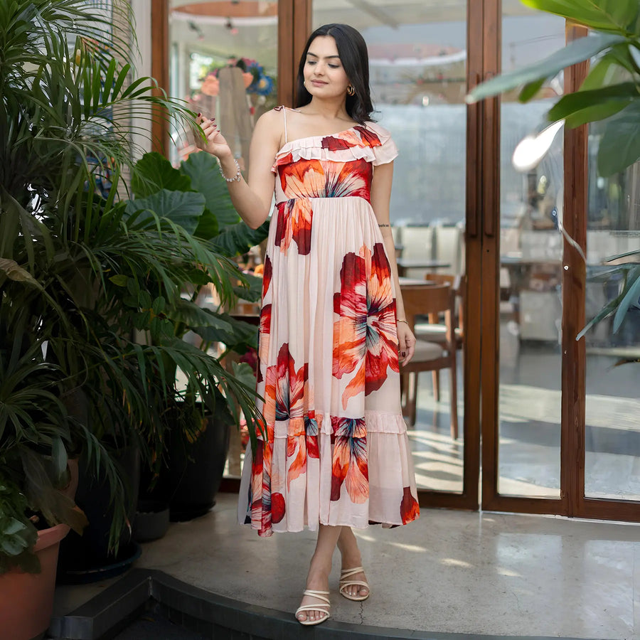Model in a floral print dress with asymmetric neckline, styled as a western one piece dress for casual outings and brunch wear.