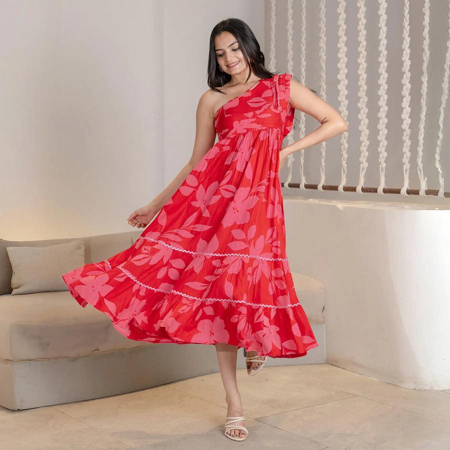 Designer-inspired floral one piece midi dress with playful movement, perfect for birthdays and summer evenings.