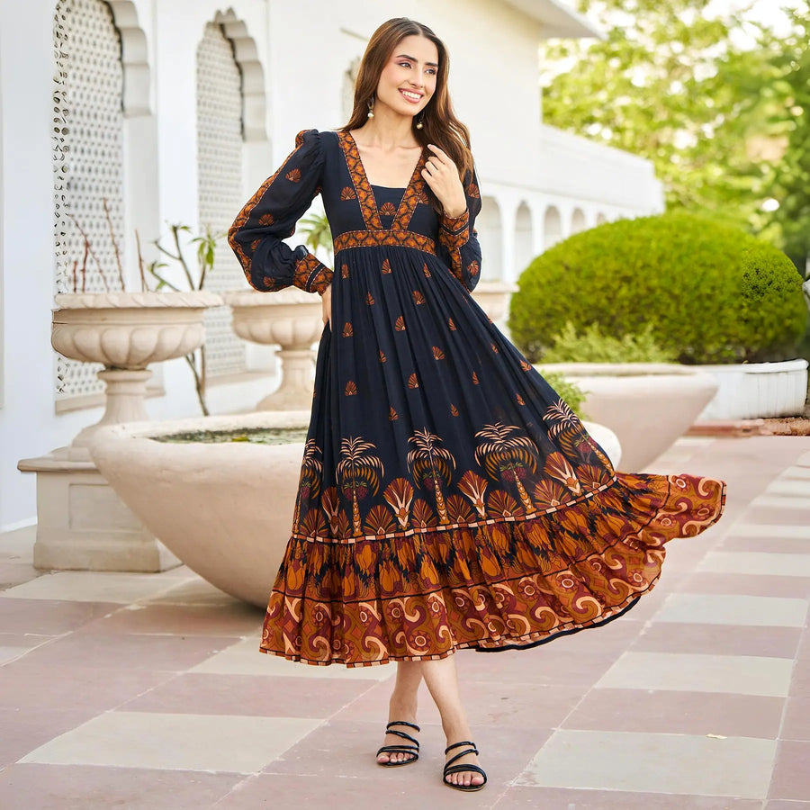 Black floral A-line midi dress for women – front pose with long puff sleeves in breathable viscose.