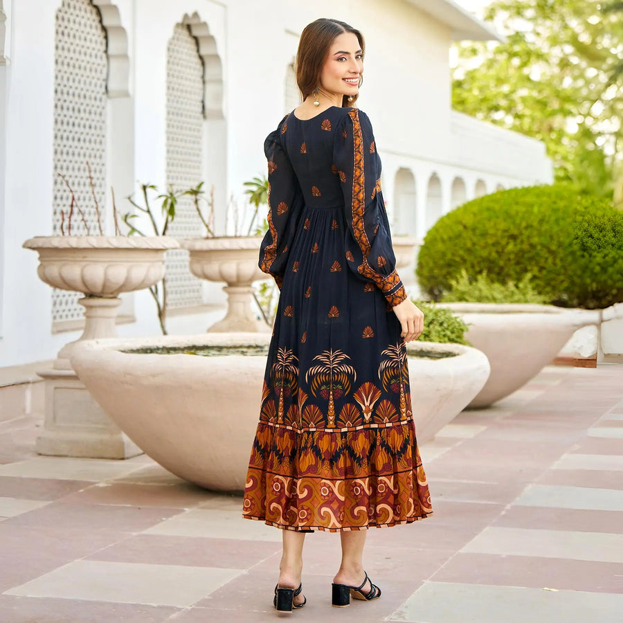 Back view of black floral midi dress for women – puffed sleeves, viscose fabric, ideal for casual occasions.