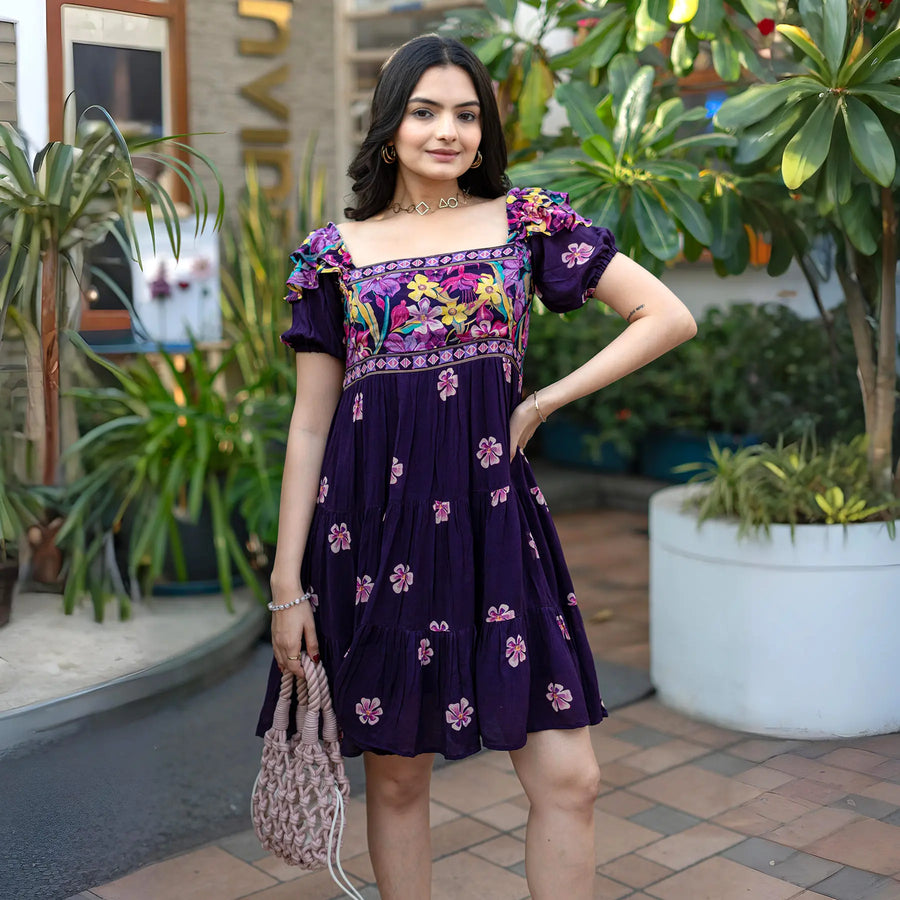 Front casual pose showing a stylish short frock for women with square neckline and floral details