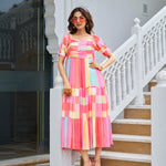 close-up of pastel puff sleeve midi dress – stylish womens vacation dresses