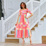 view of pastel striped midi dresses for women with puffed sleeves – perfect beach dress for women