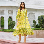 Mid-twirl shot of Haldi dress – flared ethnic print in soft viscose fabric