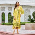 Front view of yellow ethnic midi dresses for women – summer-ready Haldi dress with bell sleeves