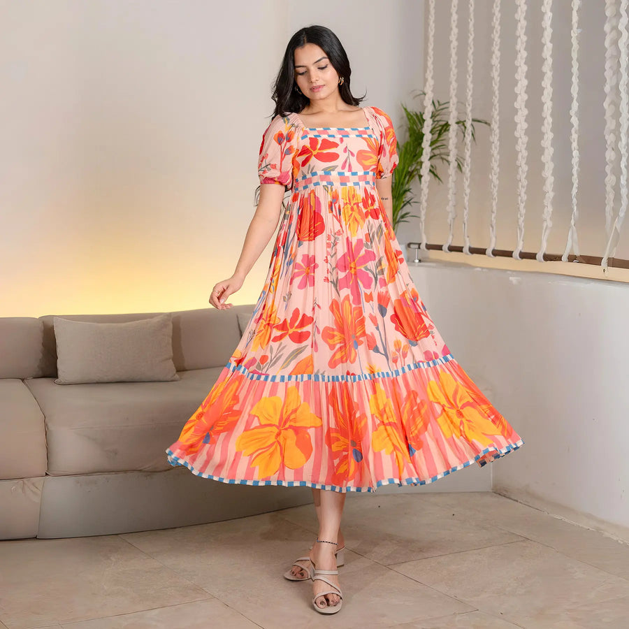 Flowing A-line floral midi dress for women in twirl pose – perfect for summer and beach dresses.