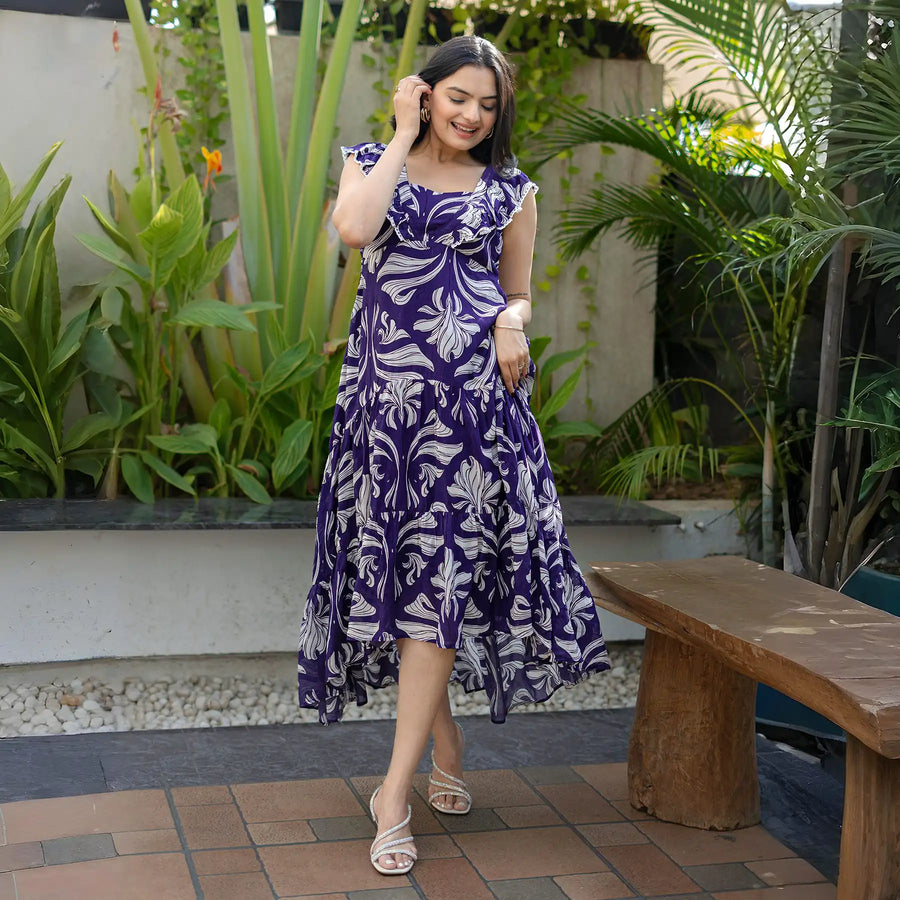 Woman walking gracefully in breathable floral maxi dress, ideal for vacations or garden parties.