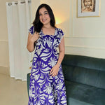 Influencer styled in Twilight Bloom floral maxi dress, perfect for casual outings.