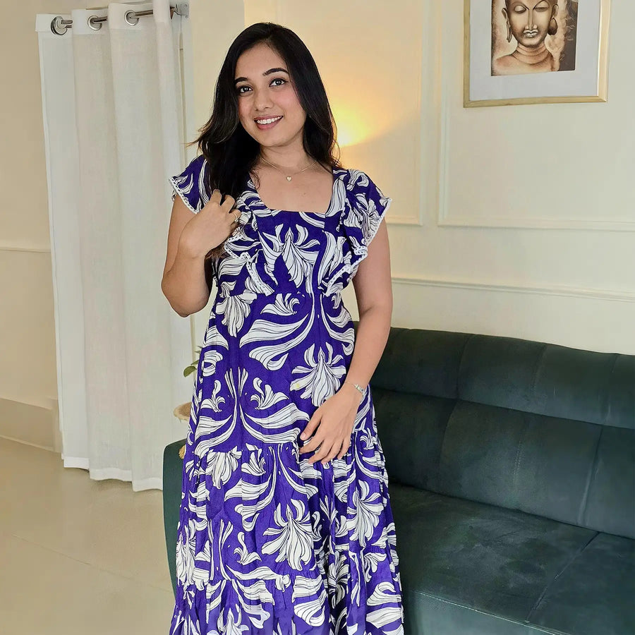 Influencer styled in Twilight Bloom floral maxi dress, perfect for casual outings.